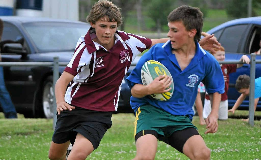 Jordyn Hodgen chases after Alex Stewart in the touch football this year. Jordyn Hodgen chases after Alex Stewart in the touch football this year.